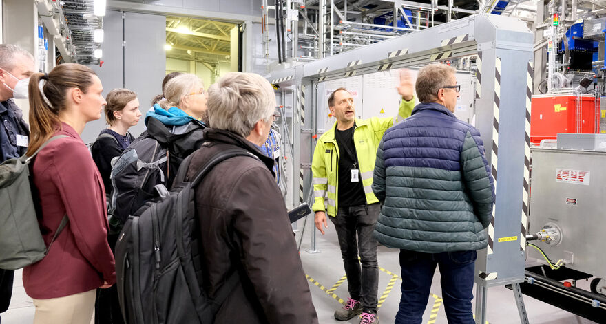 ESS's Wolfgang Hees guides attendees around the facility